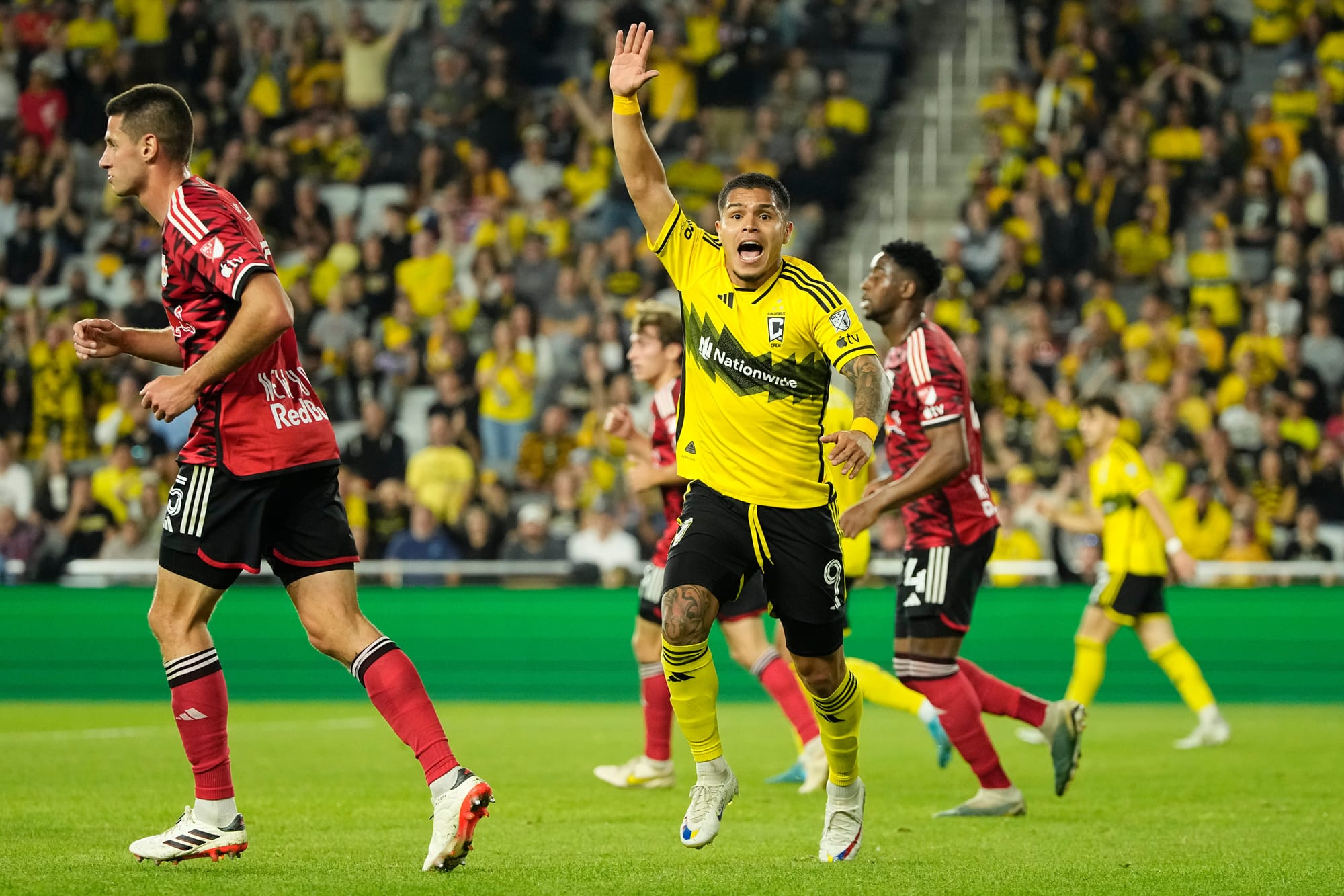 Cucho Hernandez raising his hand to get the attention of the referee during a Colmbus Crew game 
