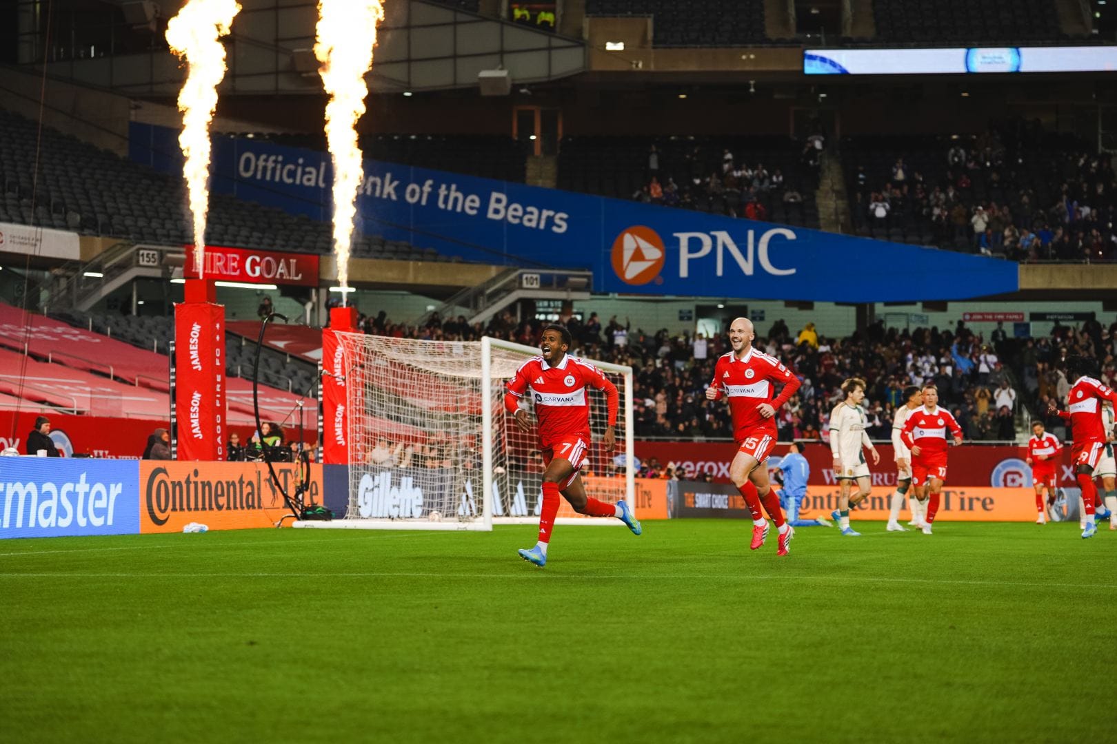 Maren Haile-Selassie and Andrew Gutman celebrate Maren's goal against Atlanta United