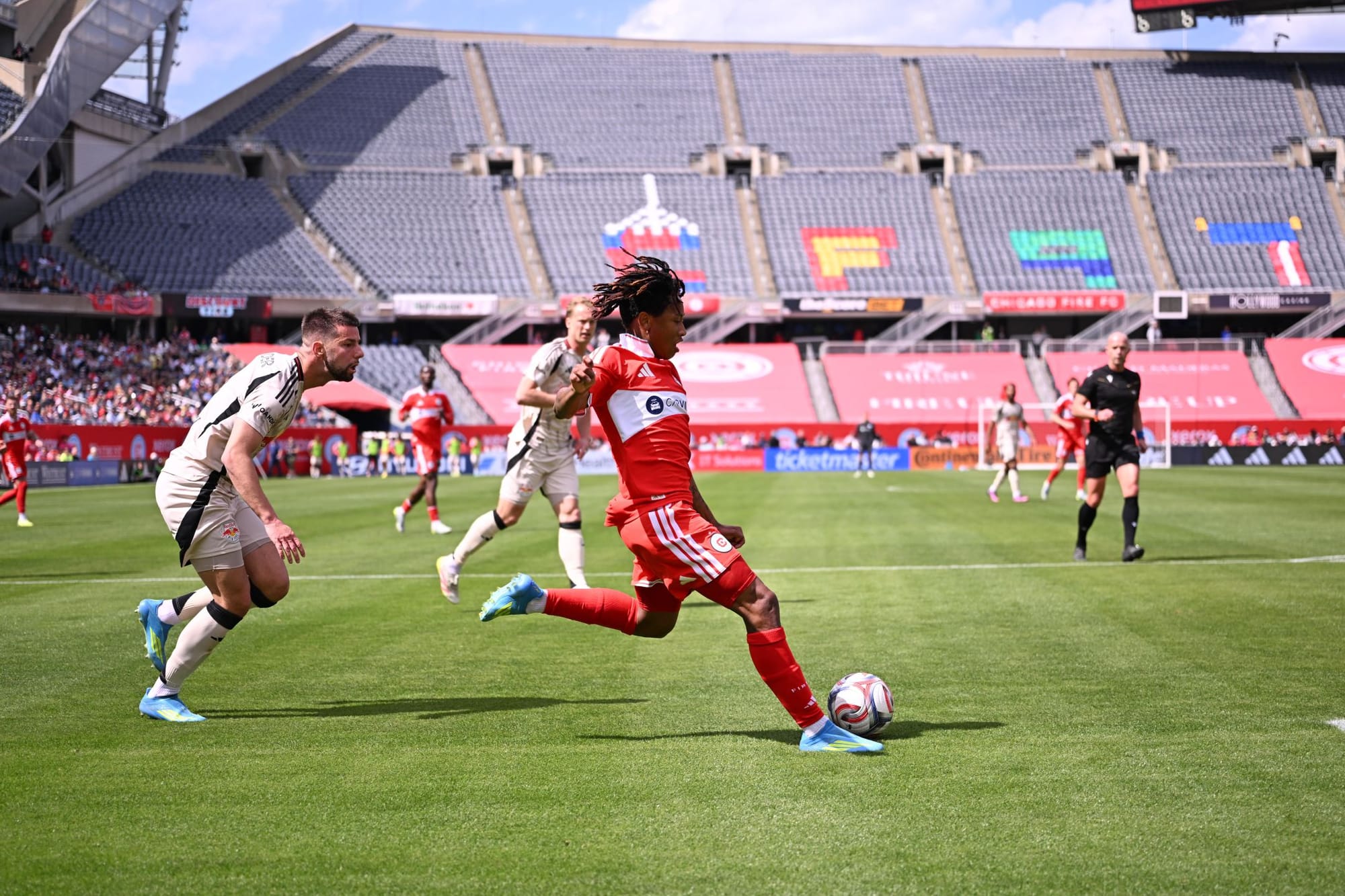 Puso Dithejane kicks the ball for the Chicago Fire vs RBNY at Soldier Field on May 9, 2026