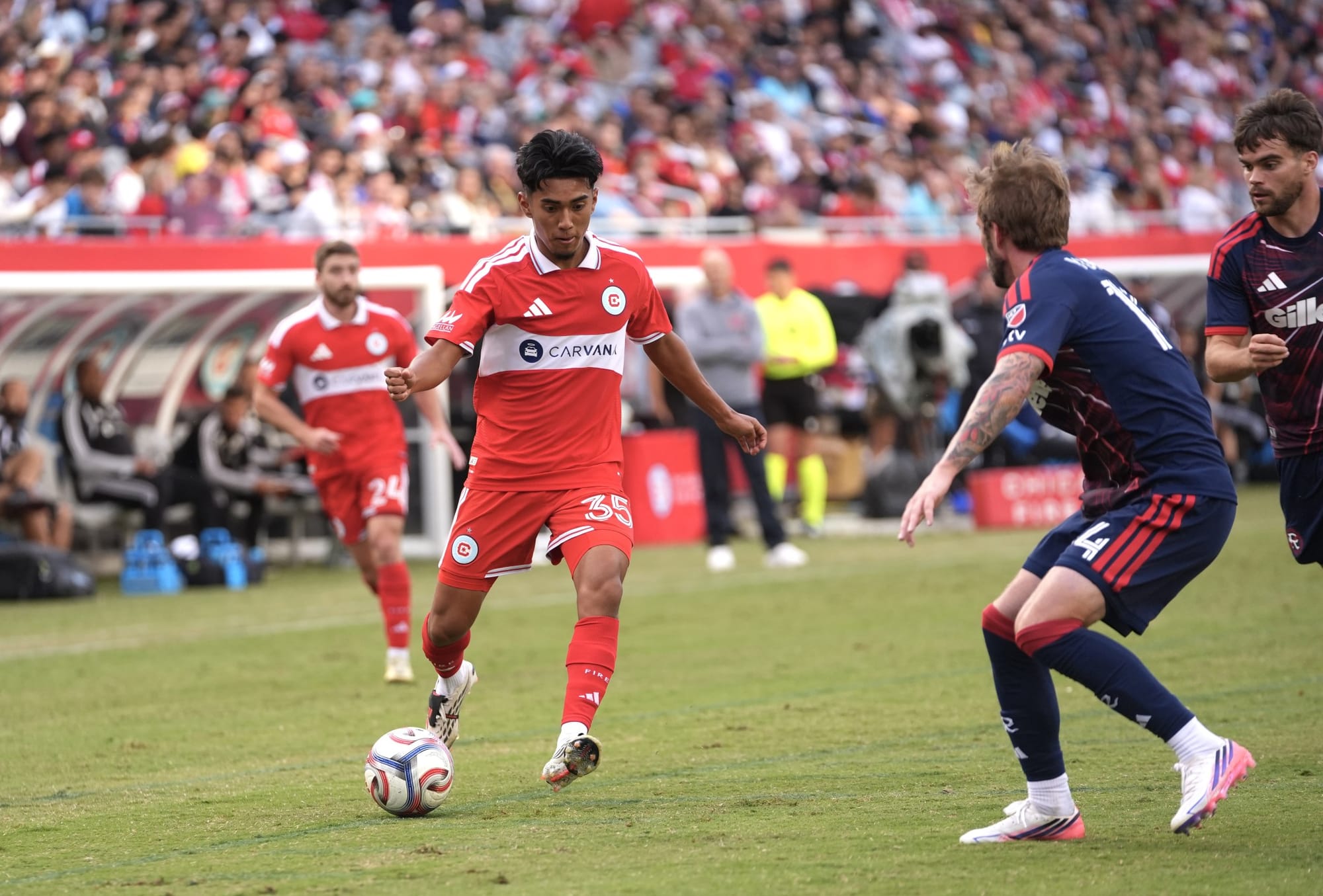 Sergio Oregel Jr plays the ball against the NEw England Revolution