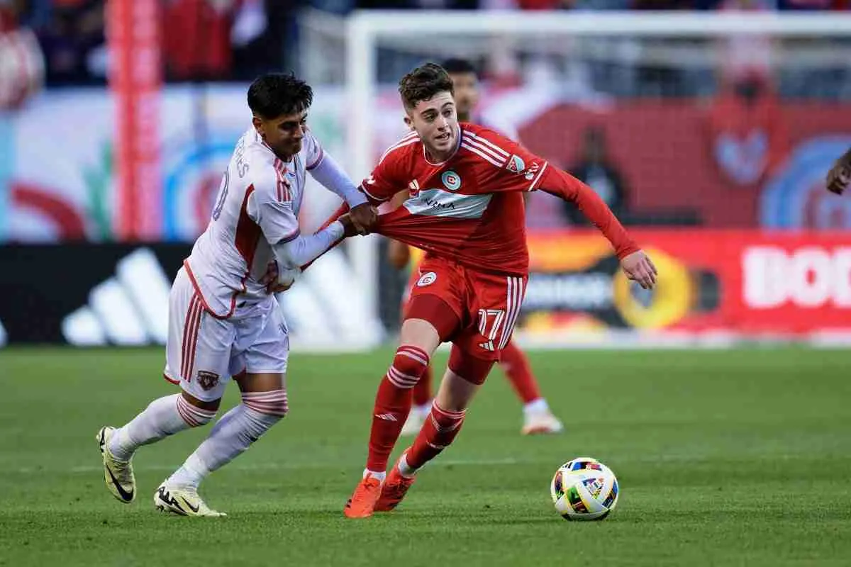 May 29, 2024; Chicago, Illinois, USA; Orlando City SC midfielder Facundo Torres (10) and Chicago Fire FC midfielder Brian Gut