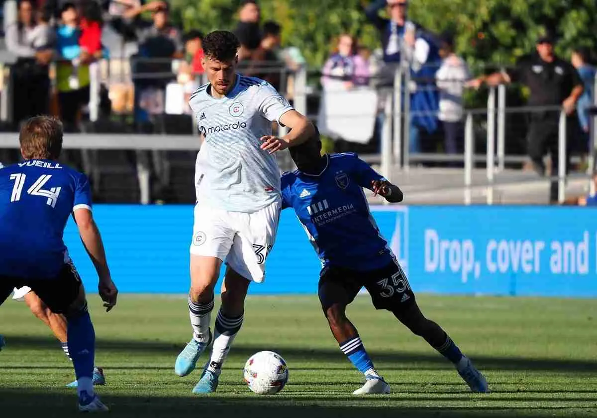 Jul 3, 2022; San Jose, California, USA; Chicago Fire midfielder Gaston Gimenez (30) controls the ball against San Jose Earthq