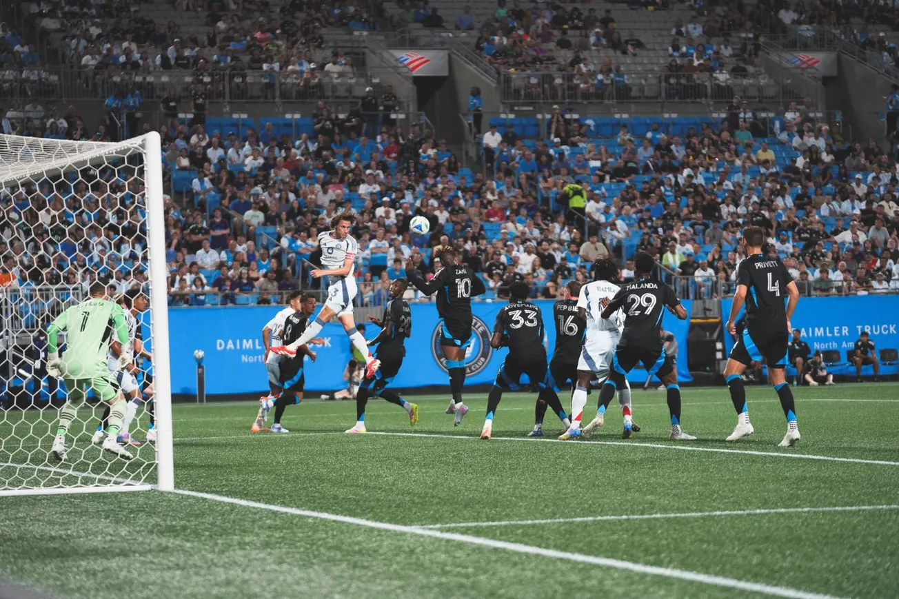 Jack Elliott heads the ball against Charlotte FC on May 17, 2025