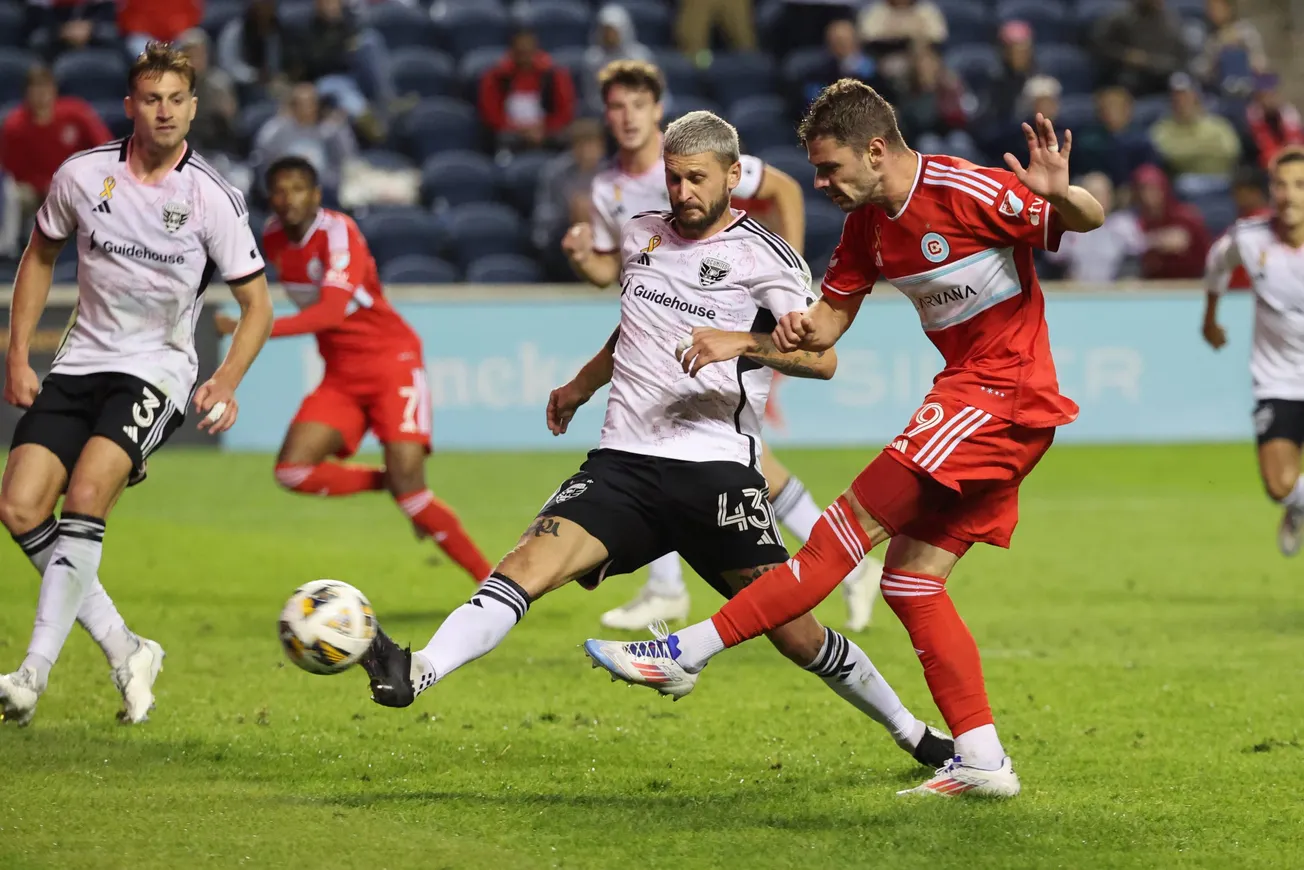 Sep 7, 2024; Chicago, Illinois, USA; Chicago Fire FC forward Hugo Cuypers (9) and D.C. United midfielder Mateusz Klich (43) b