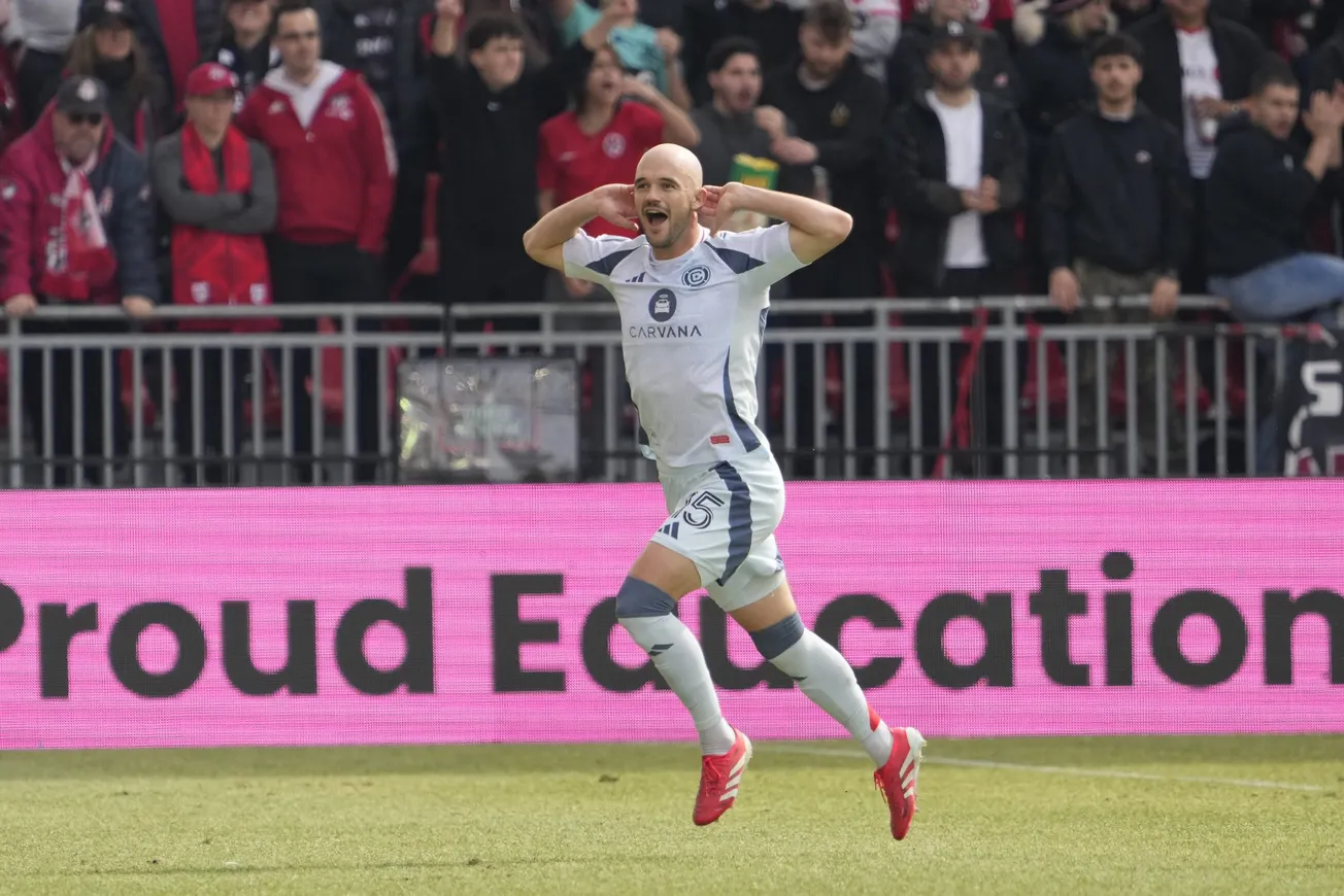 Mar 15, 2025; Toronto, Ontario, CAN; Chicago Fire defender Andrew Gutman (15) reacts after scoring against Toronto FC during