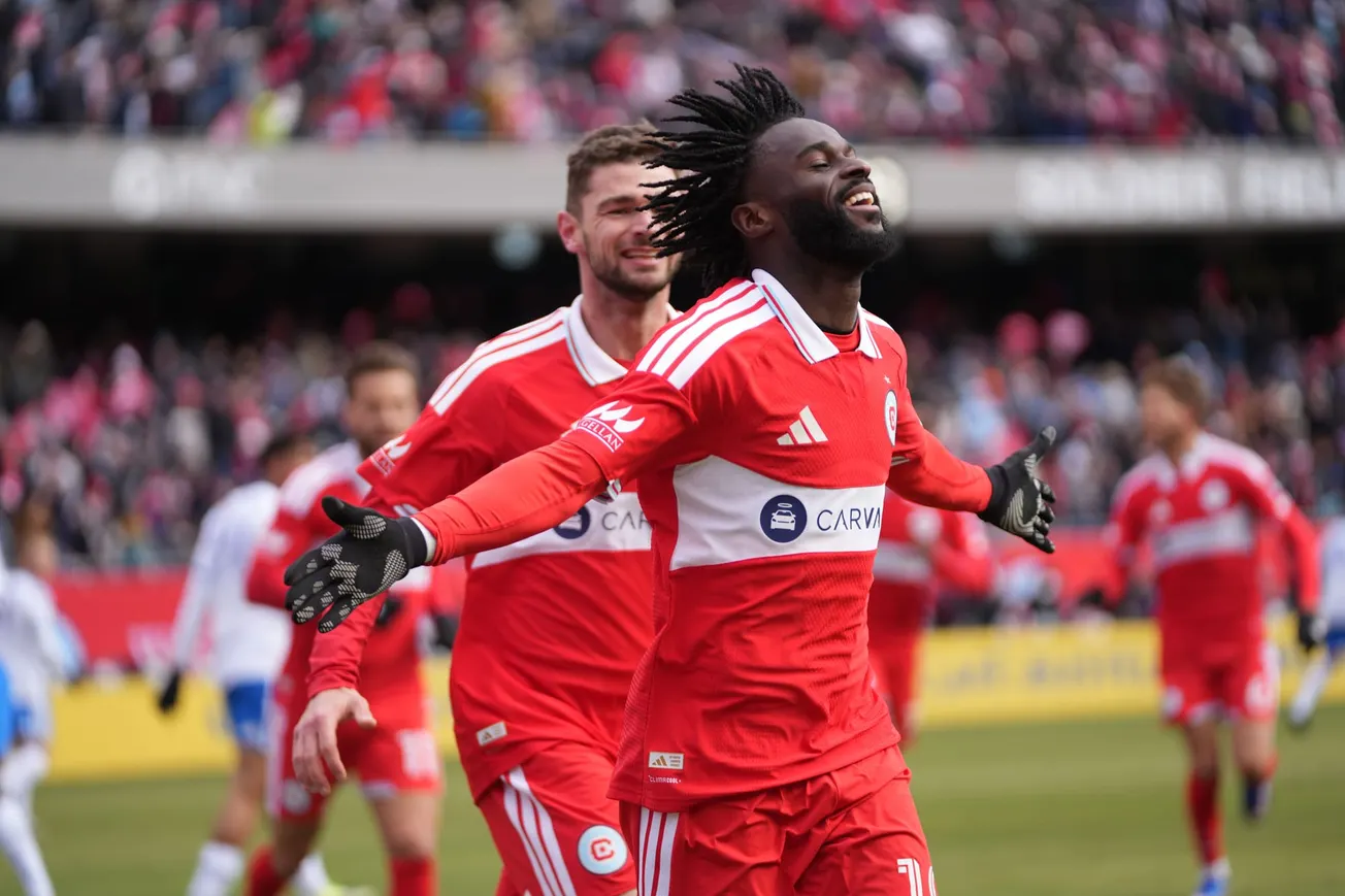 Jonathan Bamba (19) and Hugo Cuyper (9) celebrate after Bamba's opening goal at Soldier Field on February 28, 2026. 