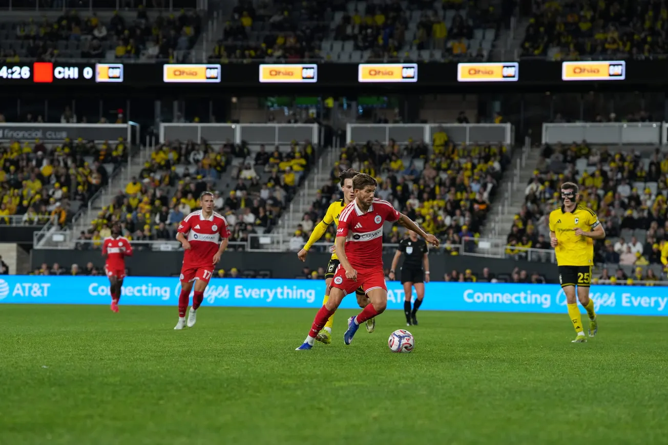 Anton Saletros and Robin Lod playing against the Columbus Crew at Scotts Miracle-Gro Field.