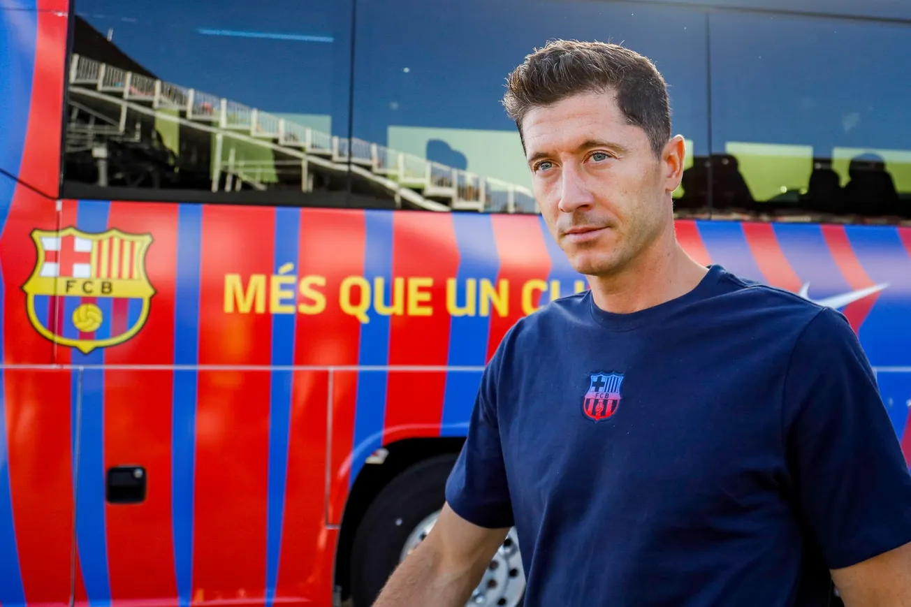Robert Lewandowski by the FC Barcelona team bus in Spain.