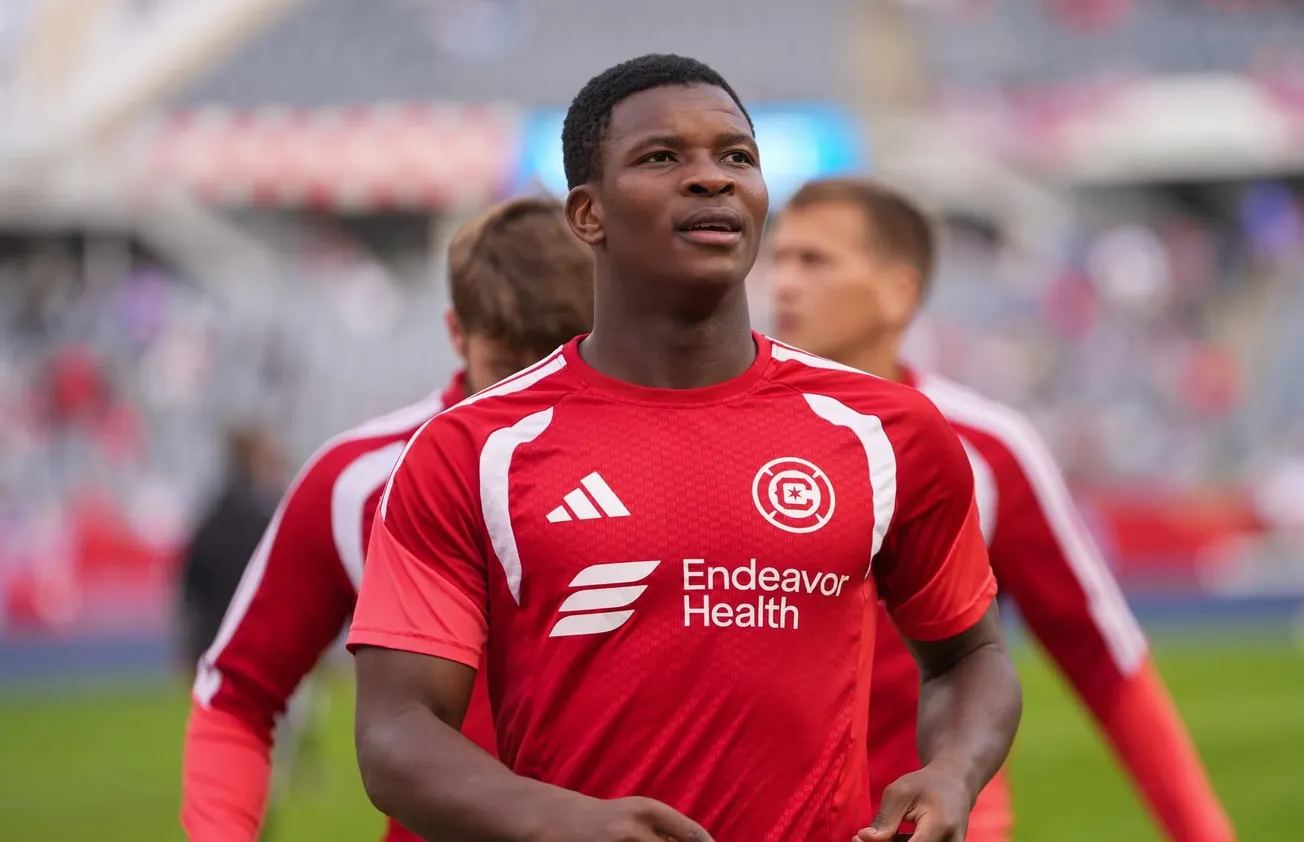 Mbekezeli Mbokazi warms up for the Chicago Fire's game against Toronto FC in Soldier Field.