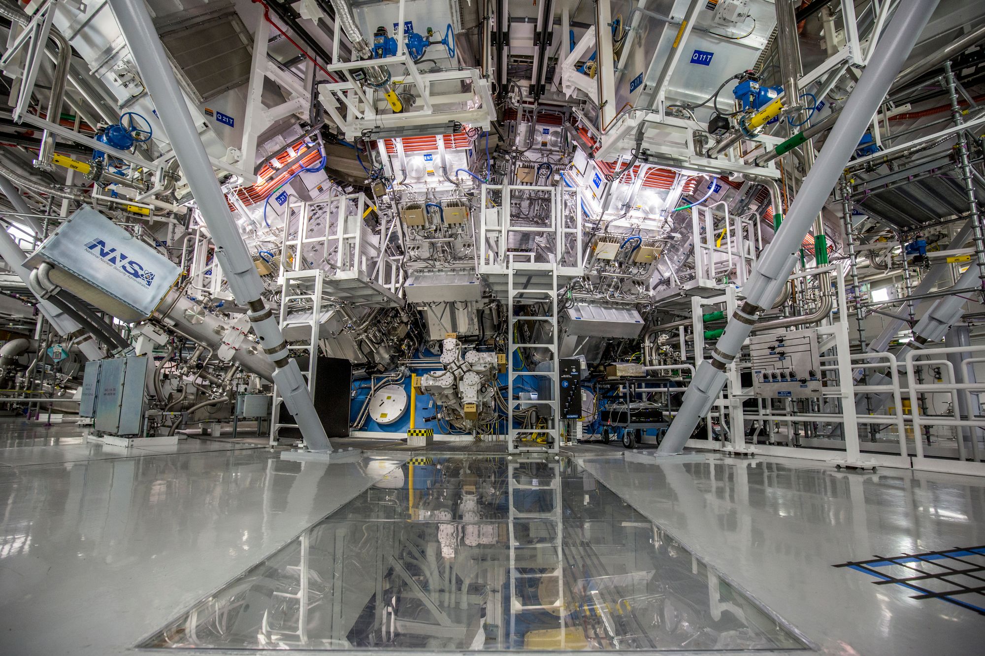 A photo of the massive lasers at the target chamber of the National Ignition Facility at LLNL.