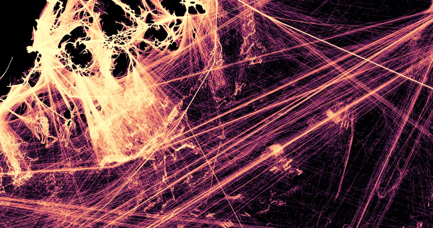 A heat map of boat tracks on the Maine coastline. Thin, luminous lines glow yellow, gold and red on a dark purple background. 