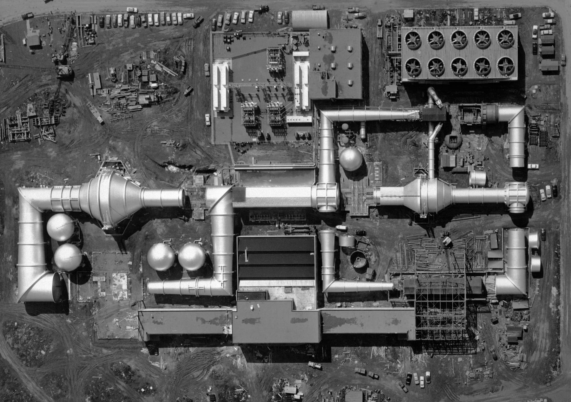 An aerial black and white photo looking down on the NASA Ames wind tunnel construction site. 