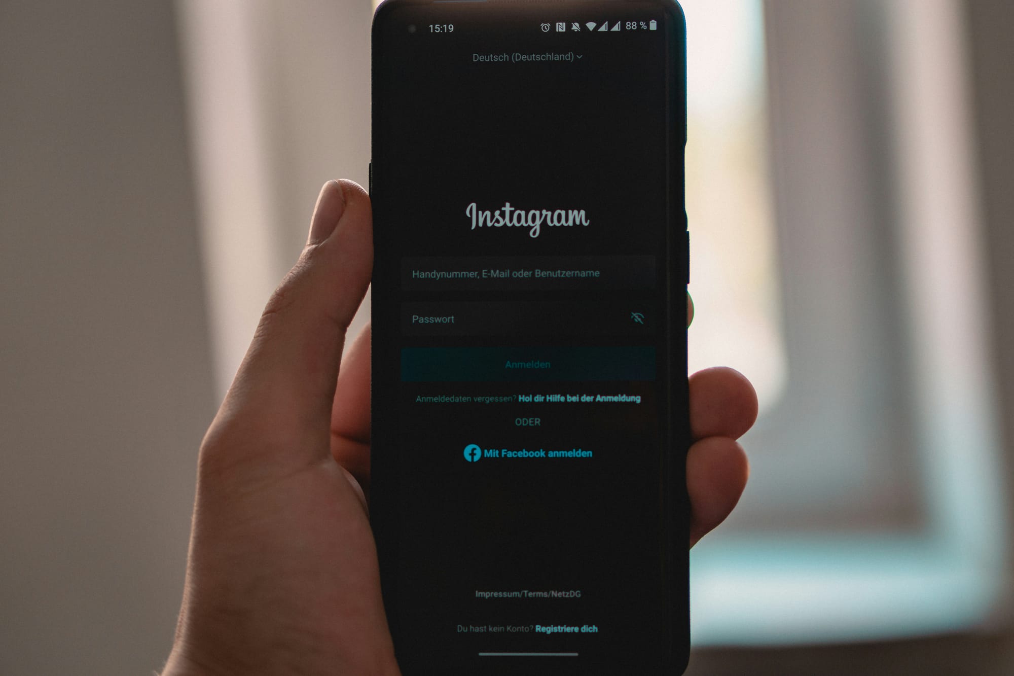 man logging in - How to Turn on Monetization on Instagram