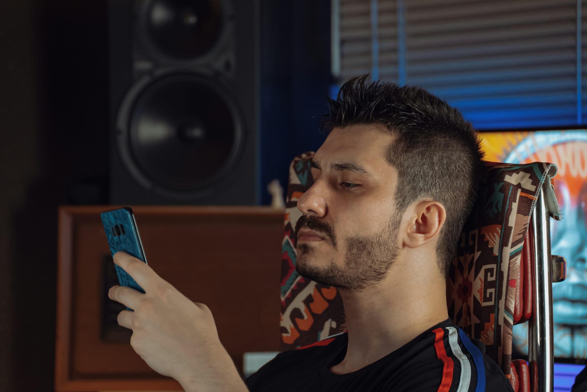 Person using Phone - How to Find Trending Sounds on TikTok