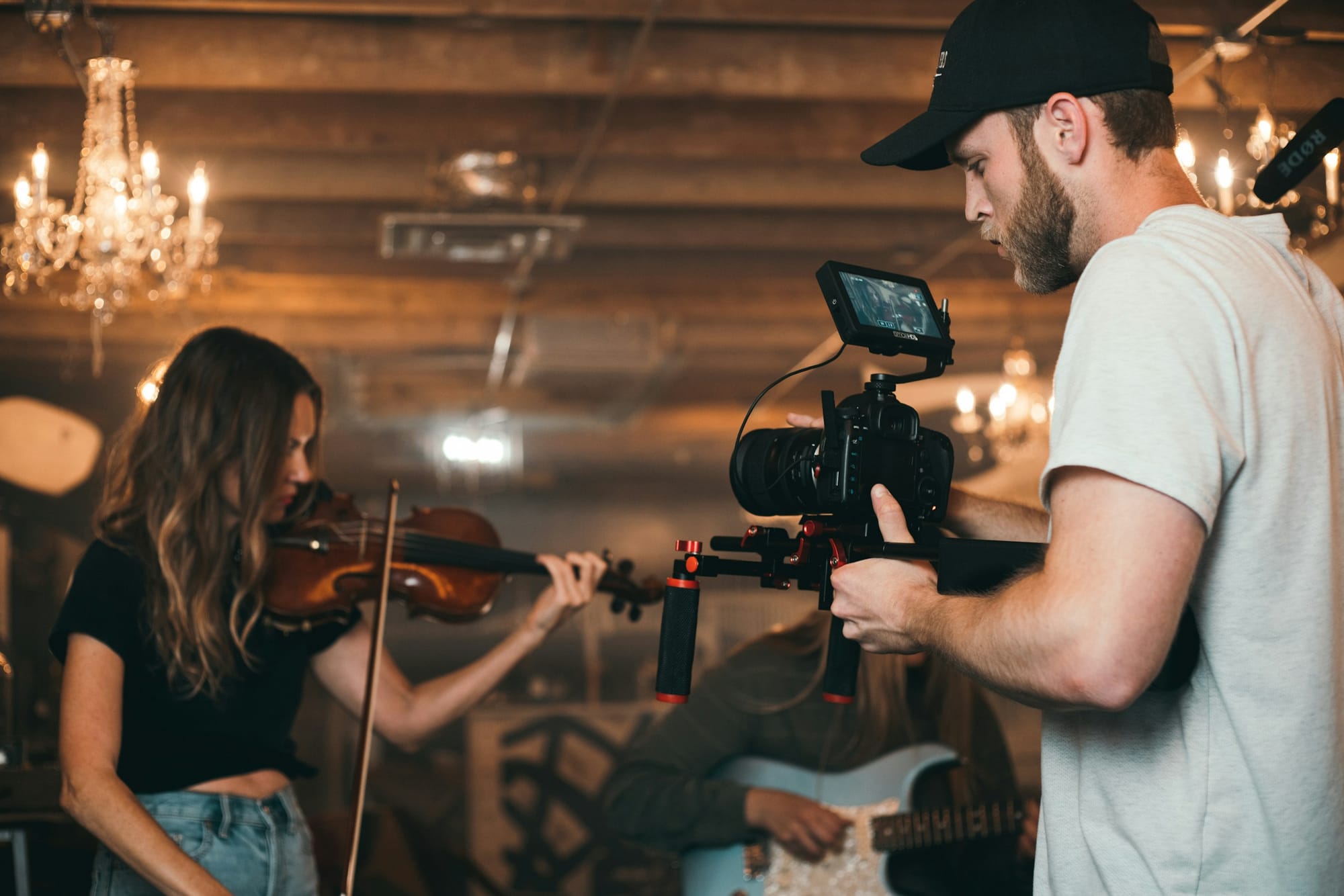 woman playing violin -  How To Create Video Content For Social Media