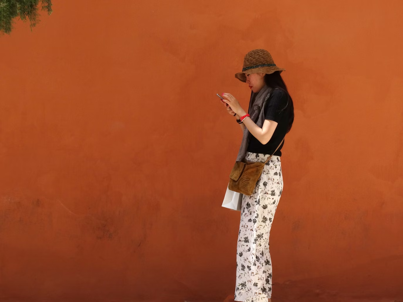 woman using a phone - How to Edit a Reel on Instagram