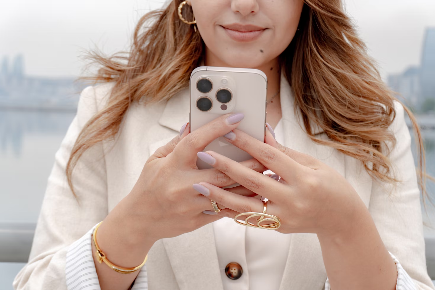 woman using an iphone - Facebook Reel vs Story