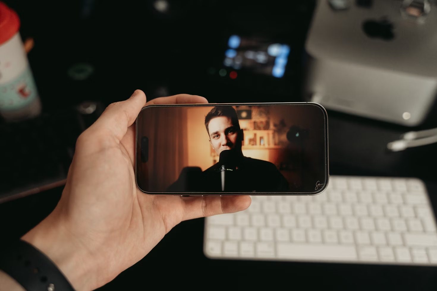 man recording himself - How to Make a Reel on Instagram With Photos