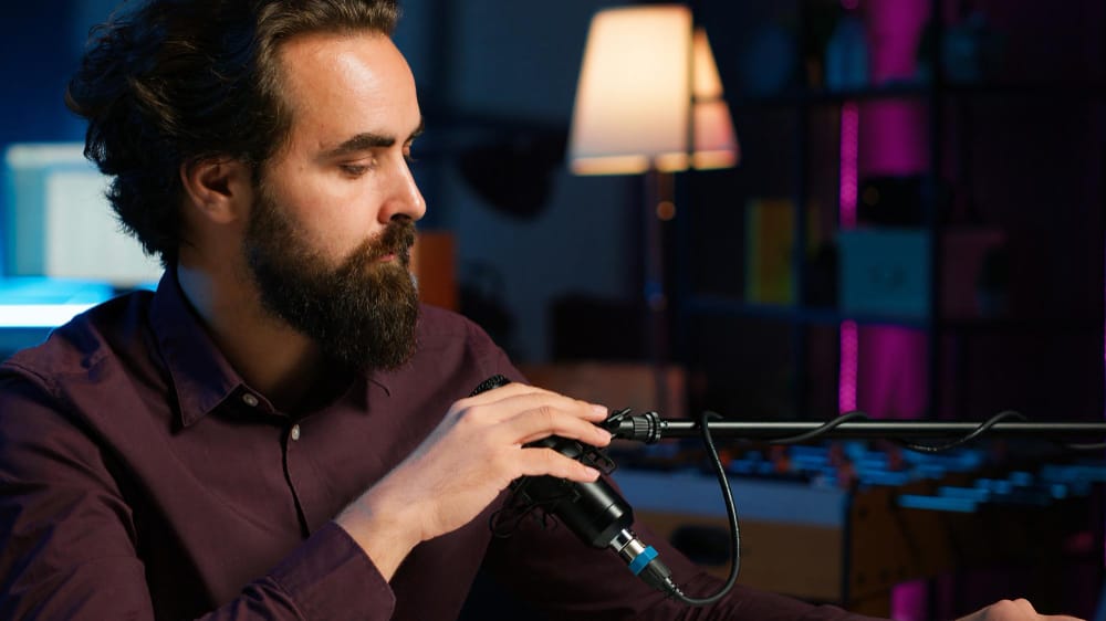 man holding a microphone - Best AI Voiceover for Video Creation