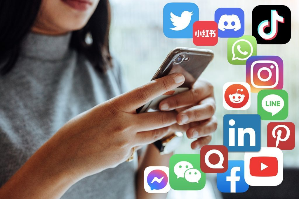 woman using social media - What To Post On Each Social Media Platform