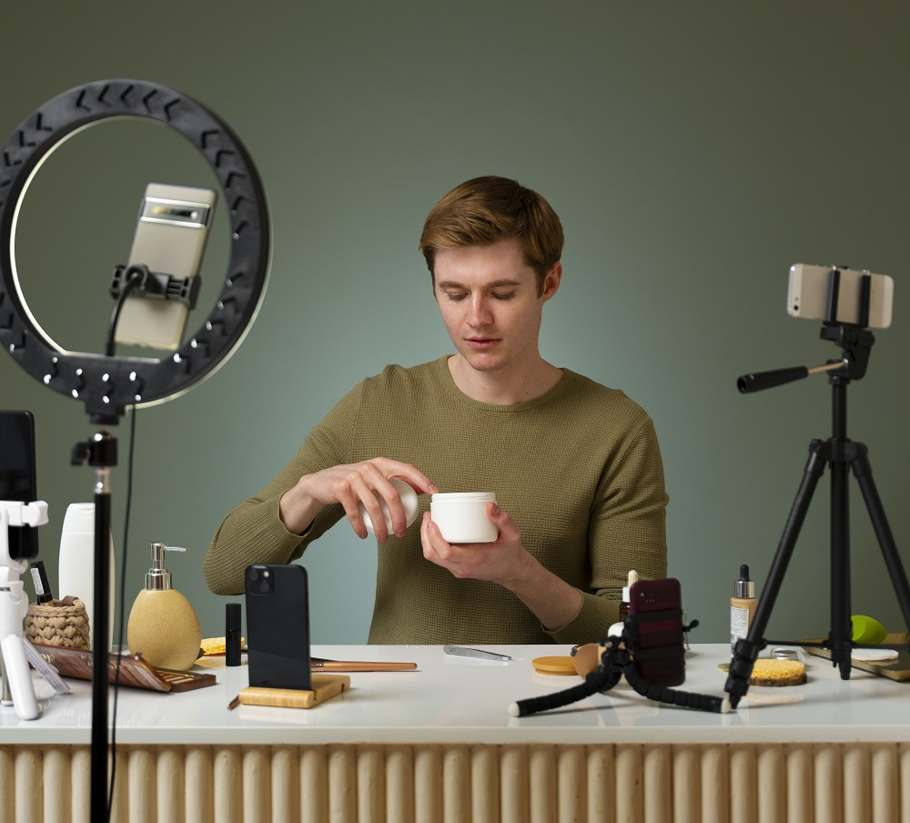 a guy doing make up - Curated content Social Media