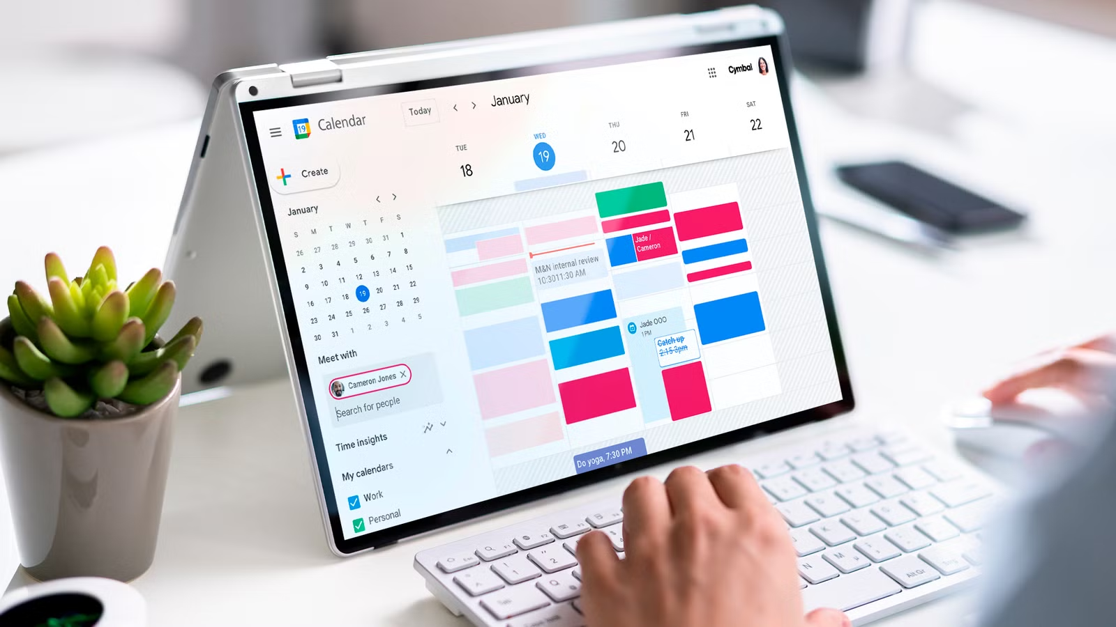 man using a calendar - What Is A Social Media Content Calendar