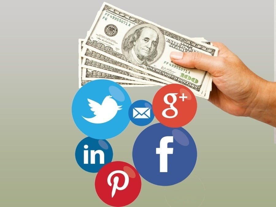 man holding dollar bills - Best Social Media Platforms To Make Money
