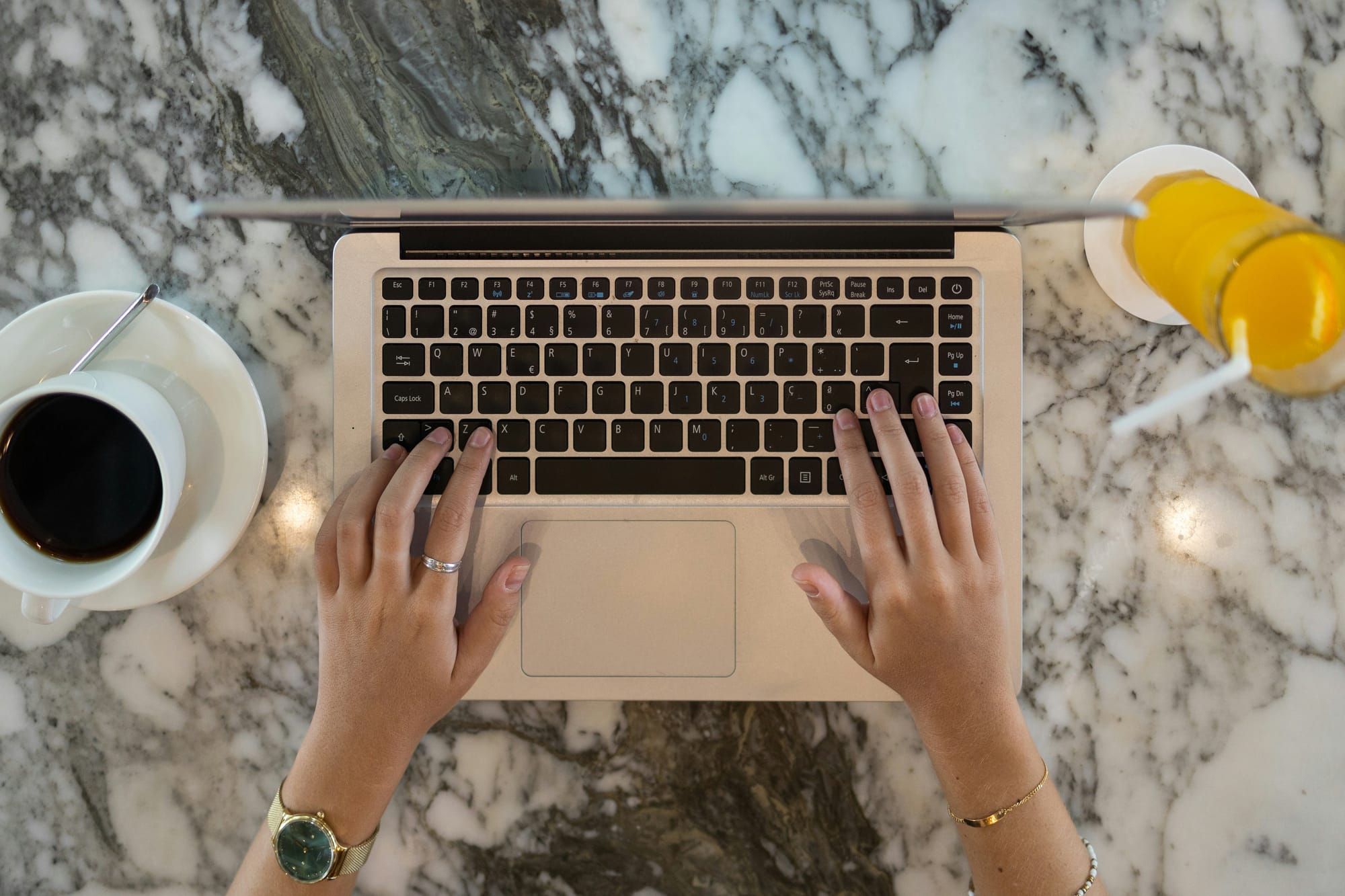 person typing on laptop -  AI Video Prompts