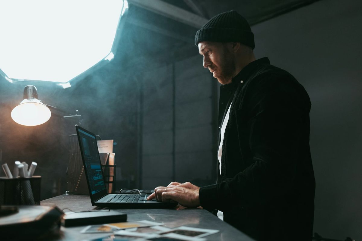 man in a studio - Veed vs. Descript
