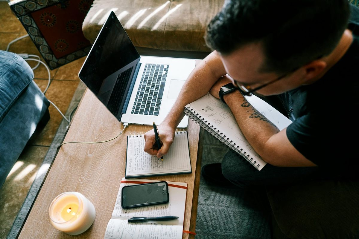 man writing - Social Media Marketing and Strategy