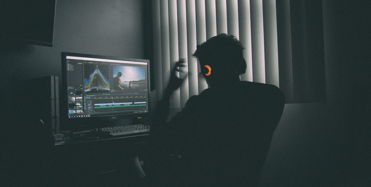 man on a desktop - Best Video Format for Social Media