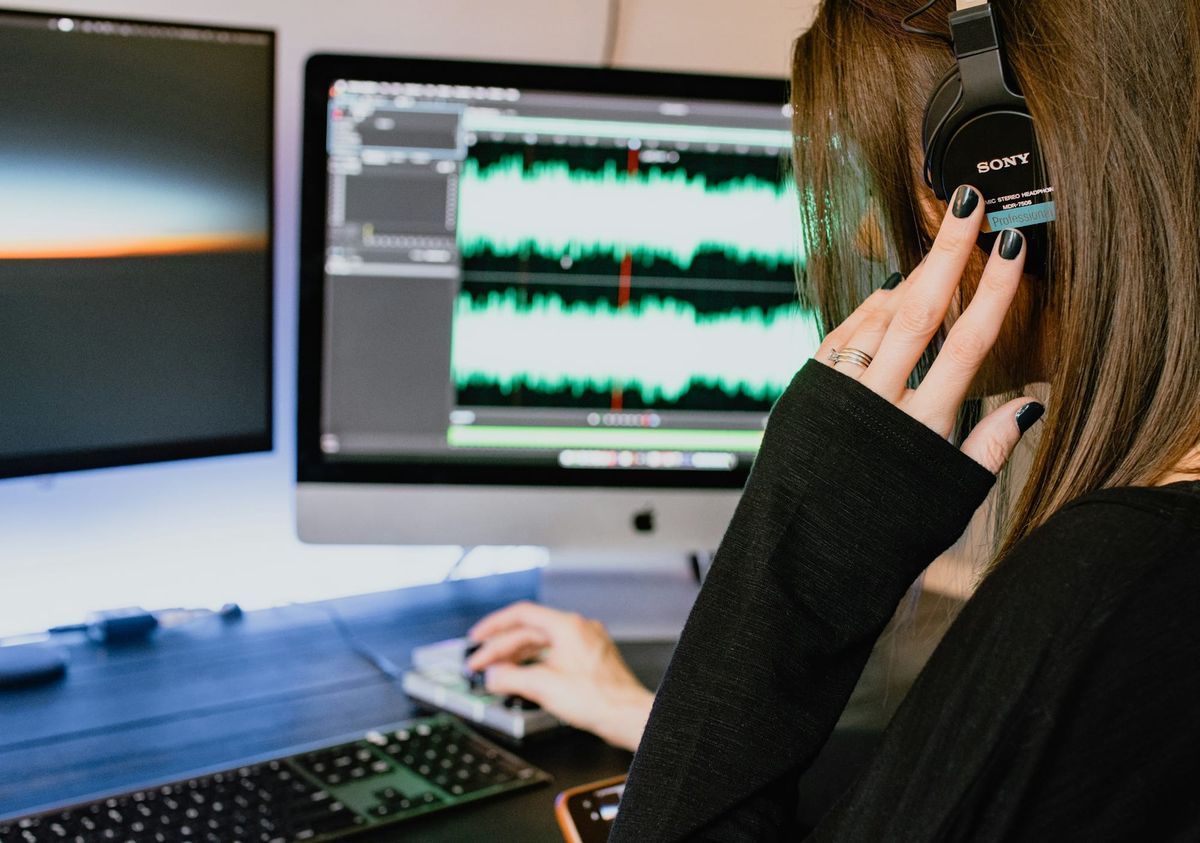 woman using headphones - Instagram Audio Downloader