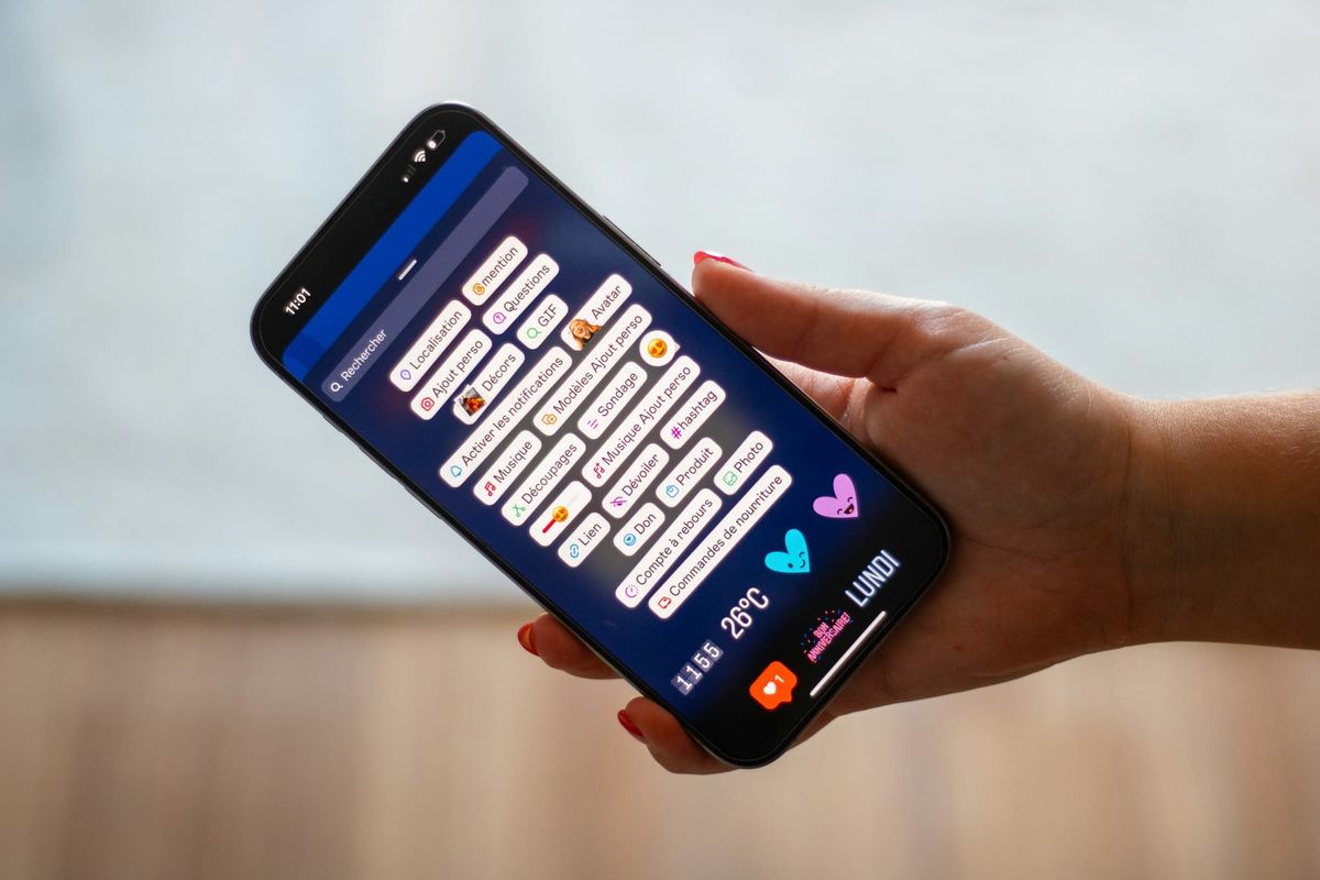 Person adding Story on Instagram - How to Repost Instagram Story