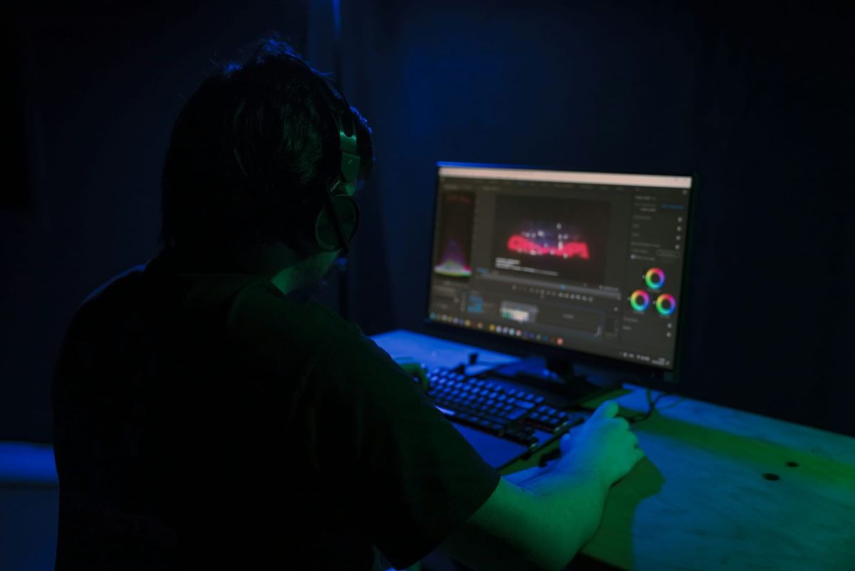 Person Working - What Is an Overlay in Video Editing