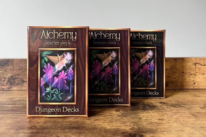 Copies of the Alchemy Starter Deck from Dungeon Decks.