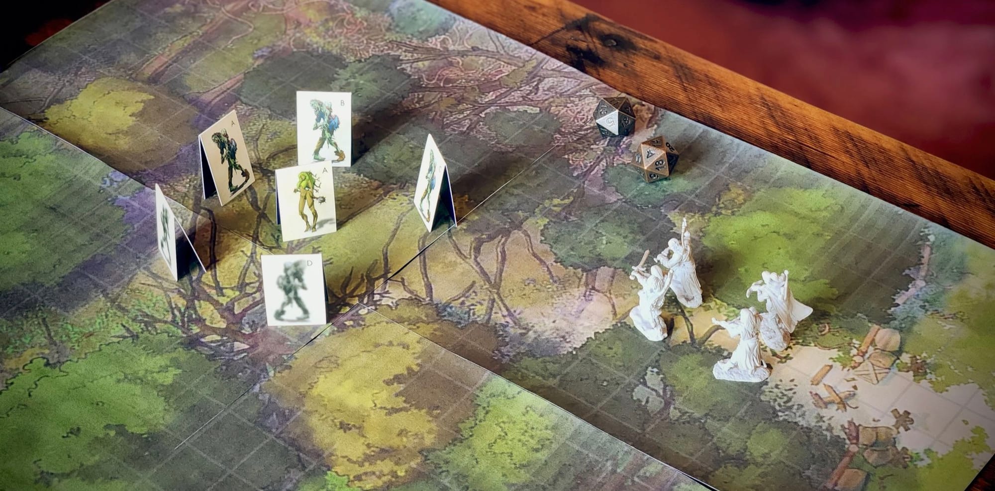 A photograph of paper mini creatures from the Tome of Summoning deployed on a printed Czepeku battlemap.