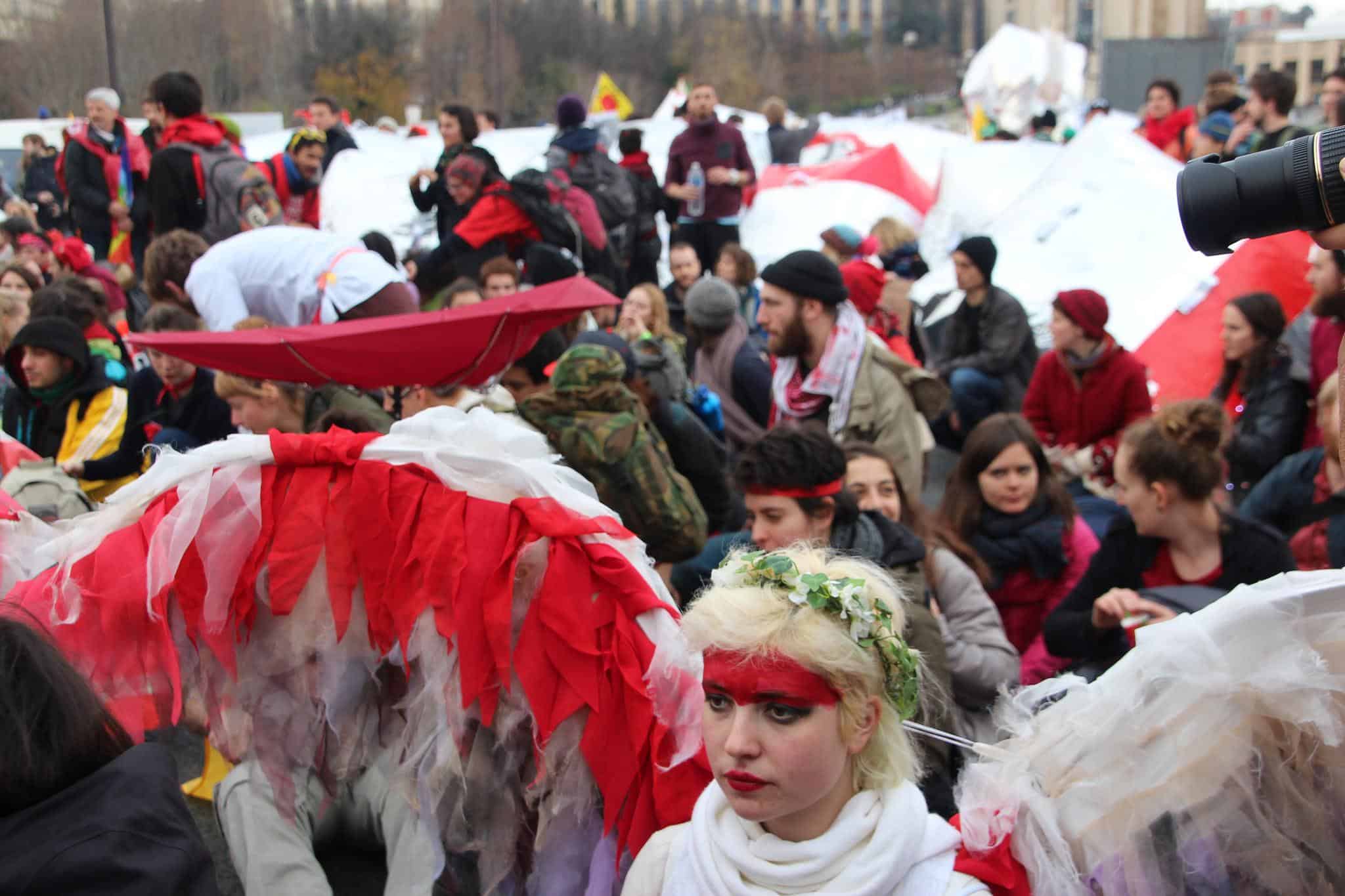 Thousands marched in December 2015 during COP21 demanding concerted international climate action. Here they march from the Arc de Triumphe to the Eiffel Tower in Paris. Image: John Englart https://www.flickr.com/photos/takver/