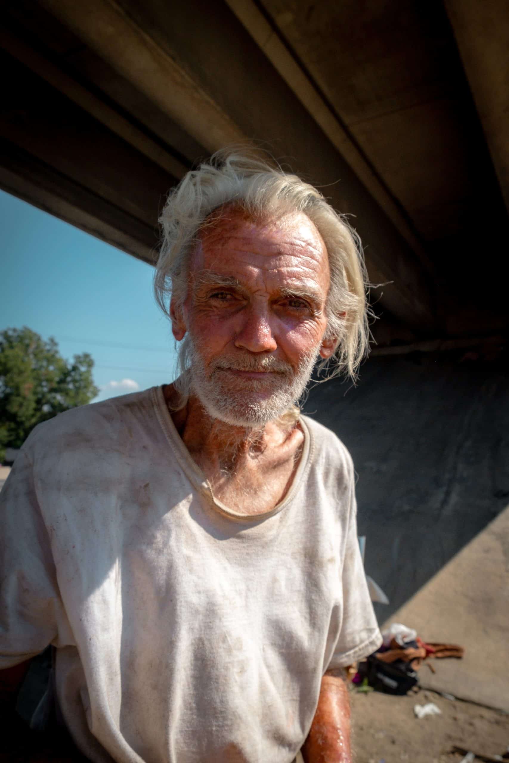 Mark Moutos beneath highway off-ramp. 