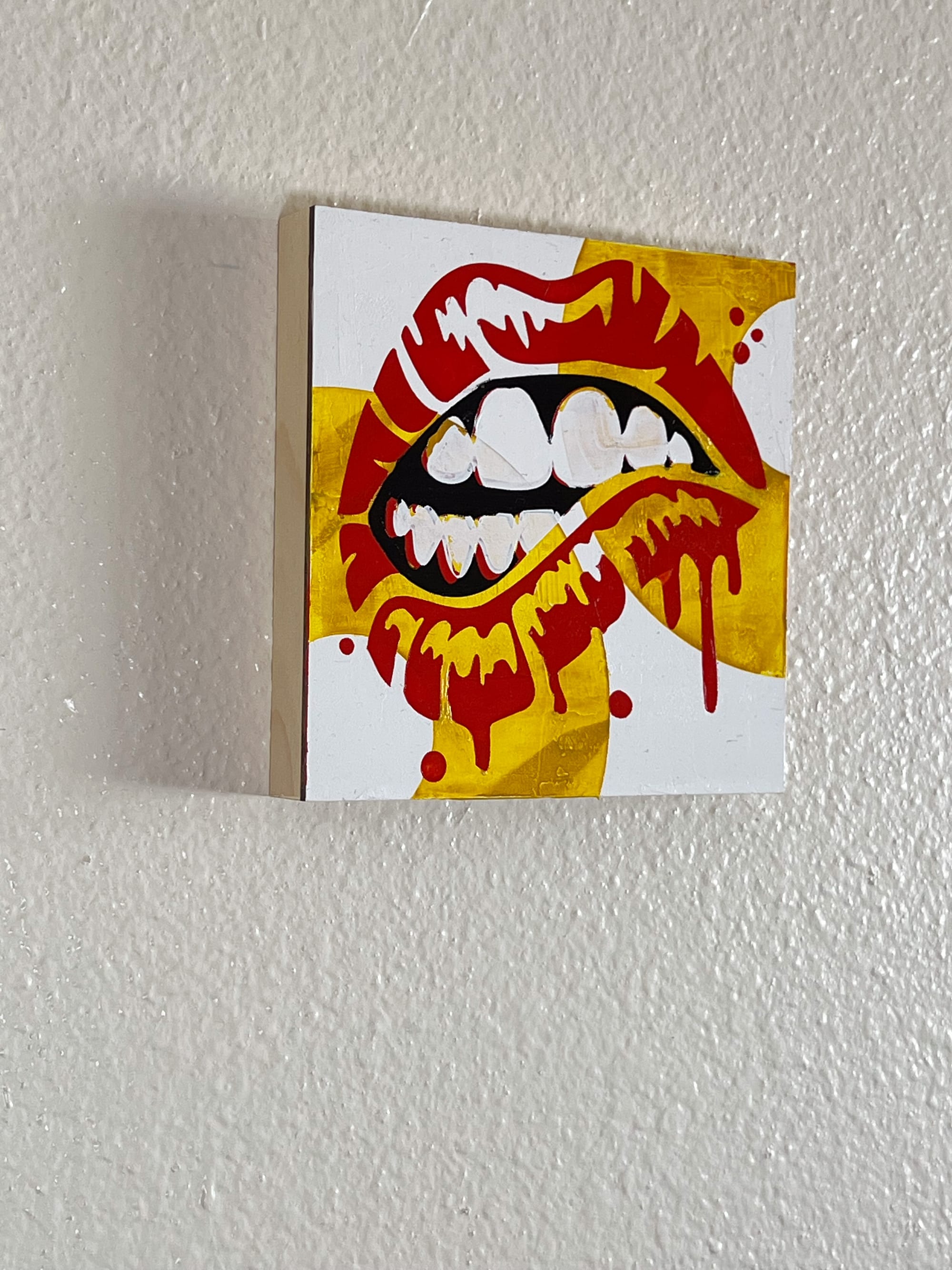Dripping Lips Painting - 6x6 Red Gold and White Pop Art Acrylic on Cradled Panel - Bold Modern Wall Art Original side view on a wall