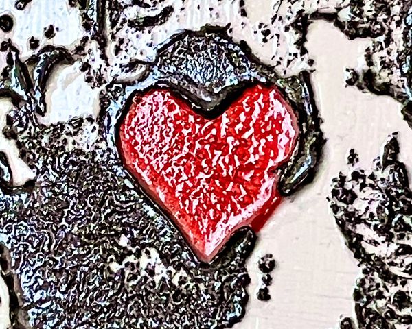 Detail of painted red heart motif on textured acrylic background, showing how symbols serve as fast-entry points into art and shift in meaning between artist and viewer. 