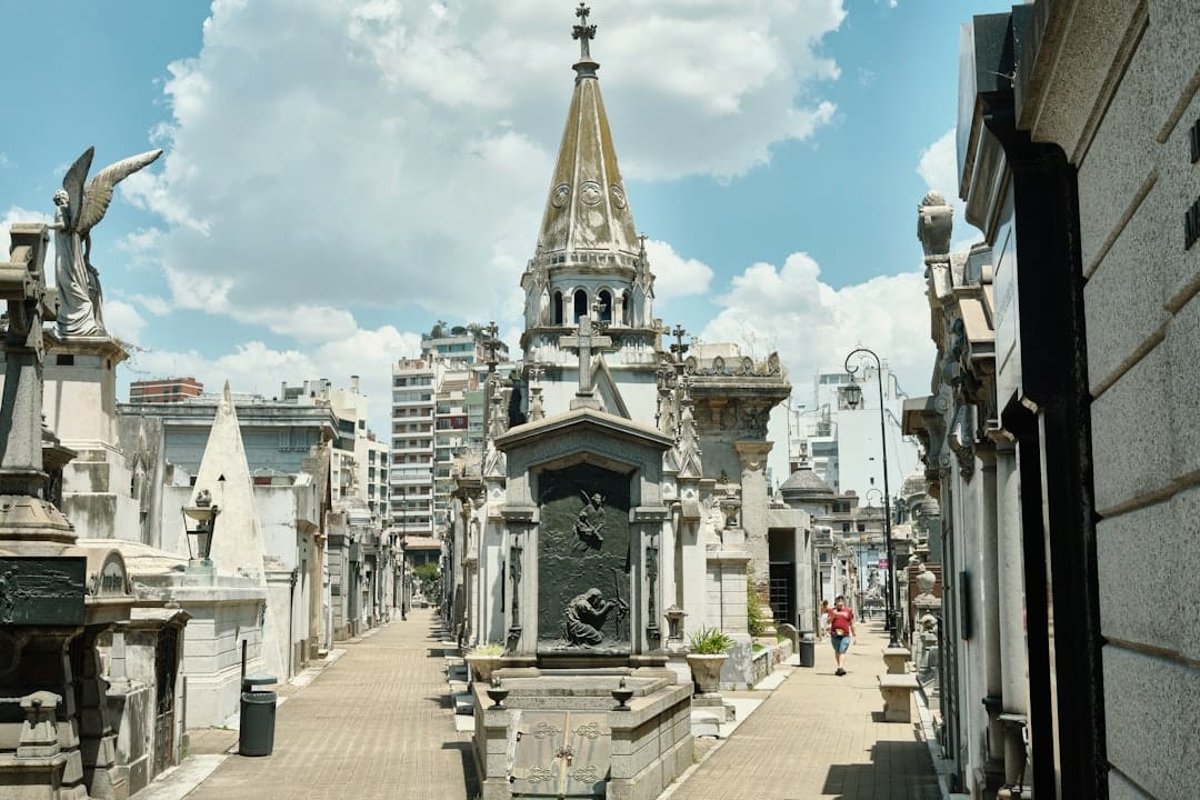 A long alley of ornate mausoleums in Recoleta Cemetery, Buenos Aires