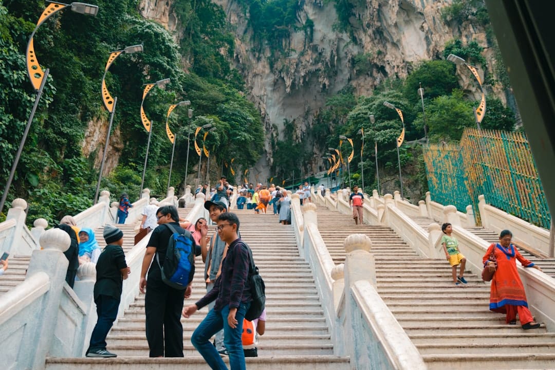 The rainbow steps and gold Murugan statue at Batu Caves