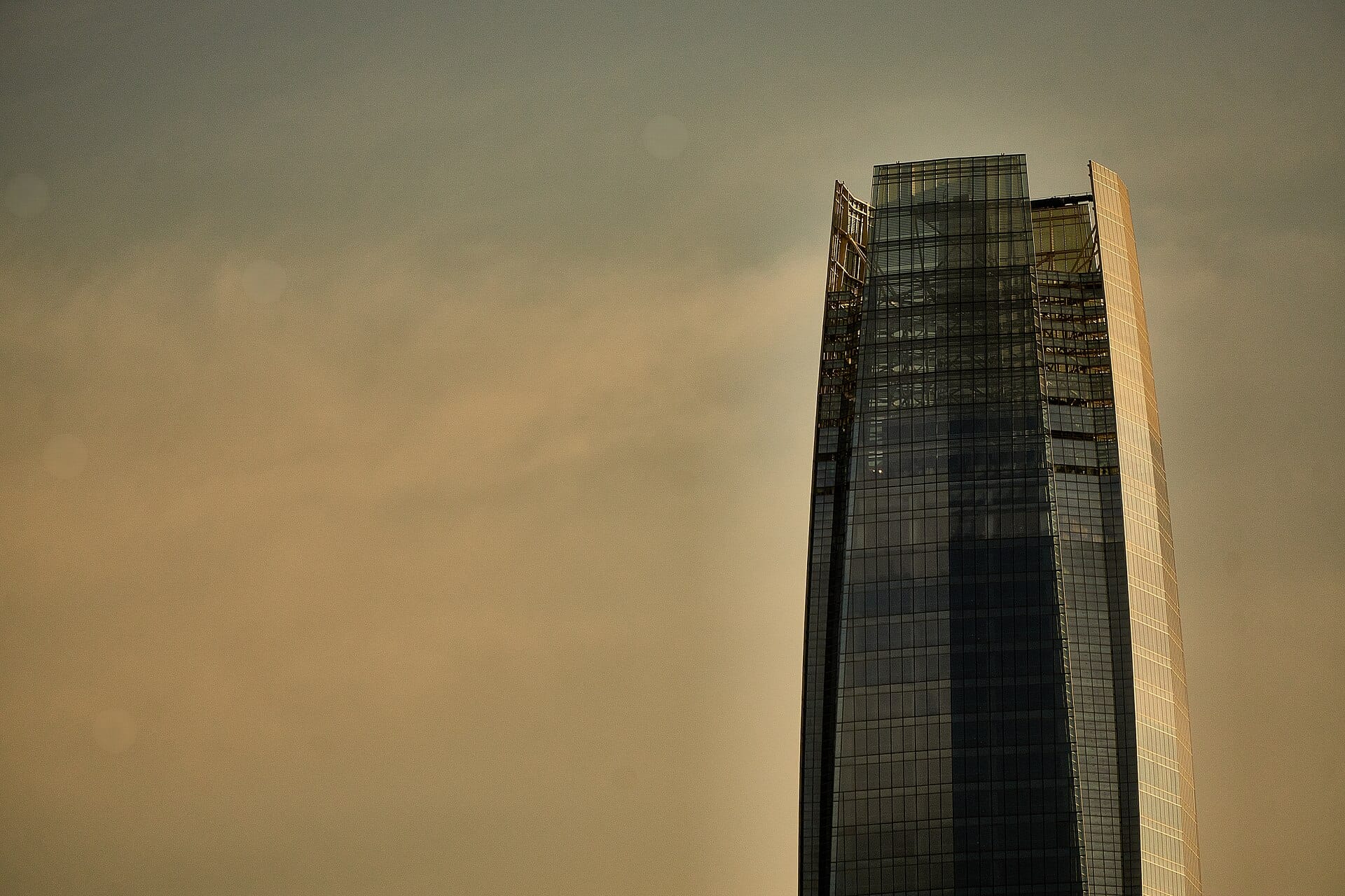 The Gran Torre Santiago skyscraper at sunset
