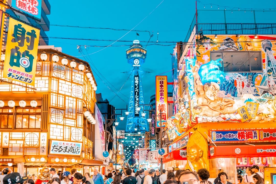 Tsutenkaku Tower rising above the Shinsekai district at dusk