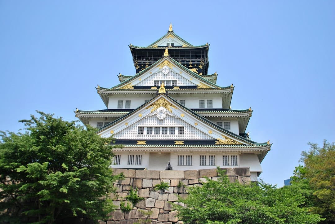 Osaka Castle main tower with stone walls and moat