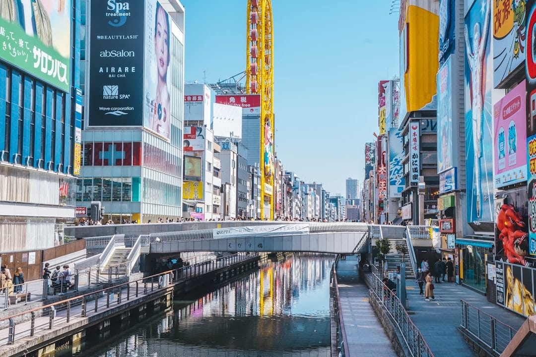 The Glico running man sign over the Dotonbori canal
