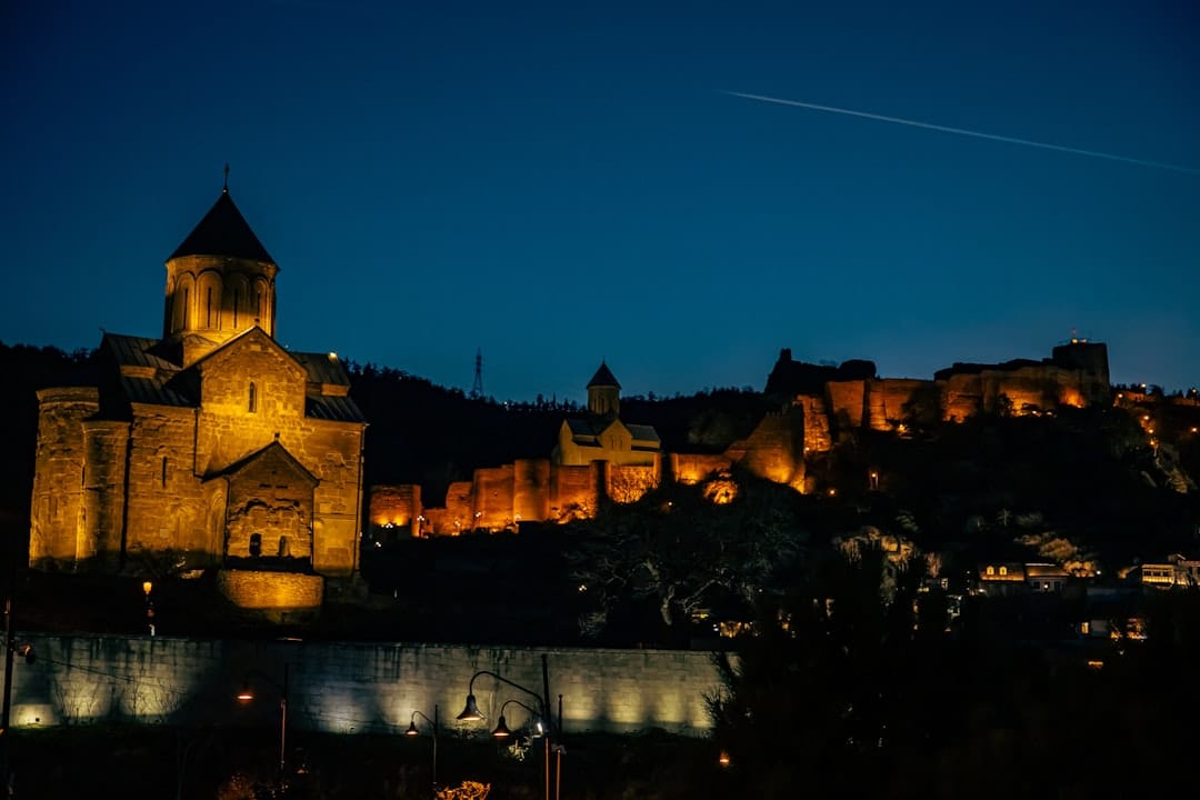Narikala Fortress lit up above Tbilisi at night