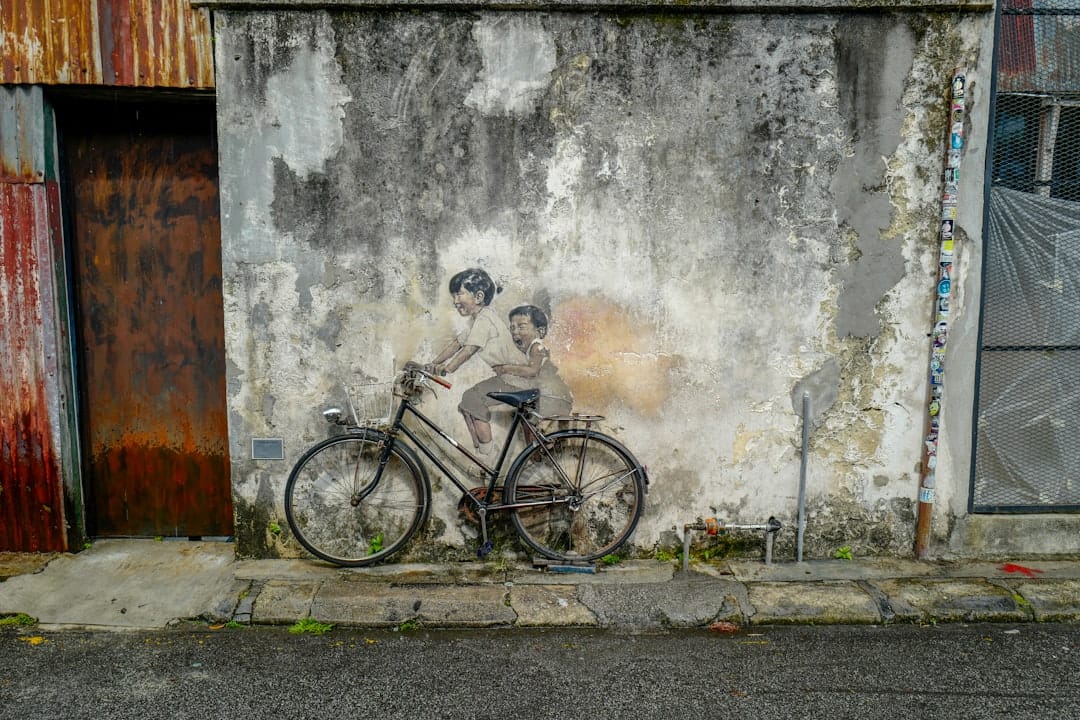 Street art mural on a shophouse wall in George Town, Penang