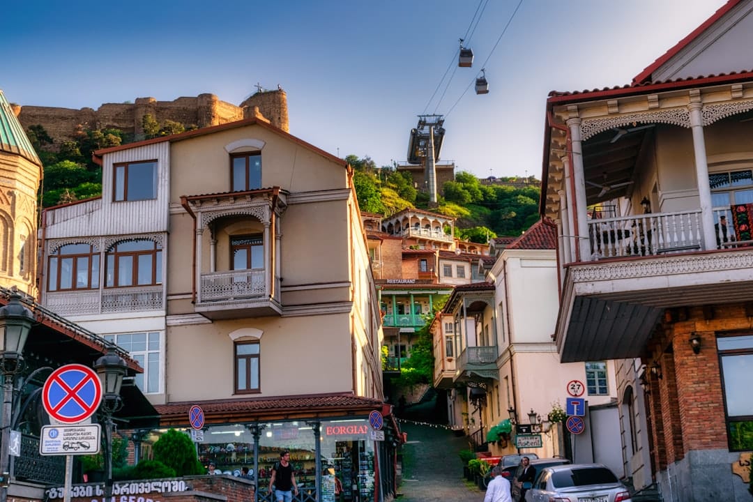 A street in Tbilisi's old town with traditional carved wooden balconies