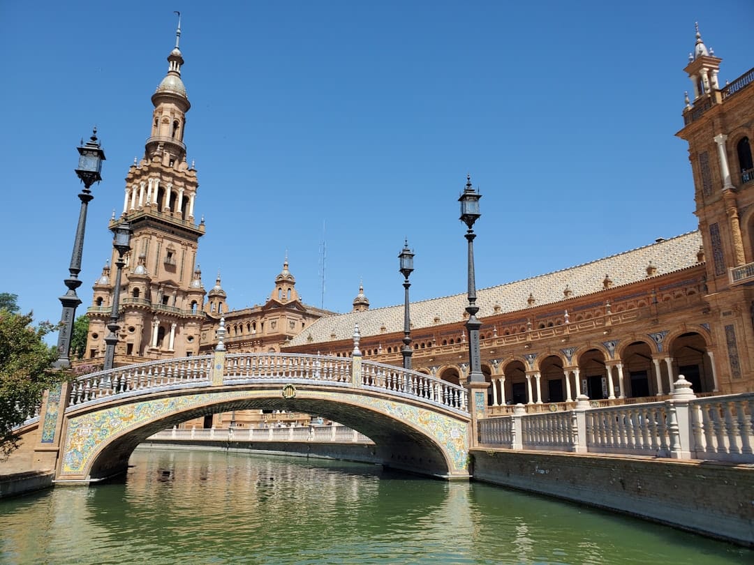 The canal and tiled bridges of Plaza de Espana in Seville
